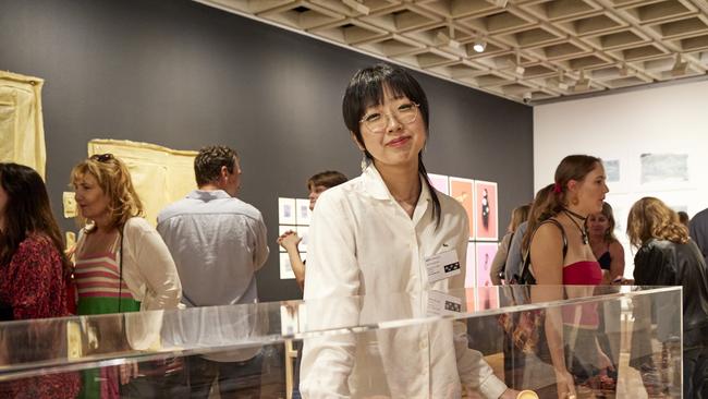 Mana Sugimoto, Marist Sisters College Woolwich, with her work 'My porcelain dolls'. Photo: Mim Stirling