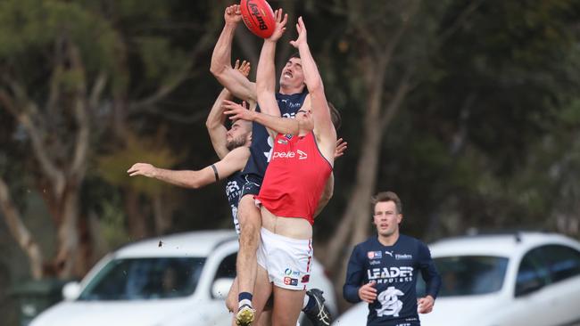 South Adelaide’s Oscar Clavarino spoils Norwood's Luke Surman at Noarlunga Oval. Picture: Cory Sutton / SANFL