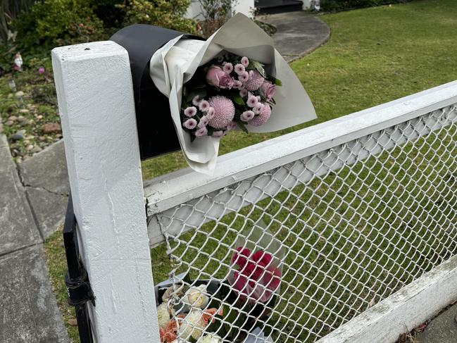 Floral tributes are left at the home of Lolene Whitehand. Picture: Supplied