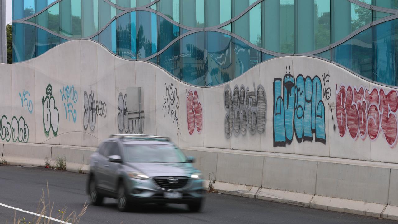 Vandals graffiti the concrete barriers. Picture: Brendan Beckett