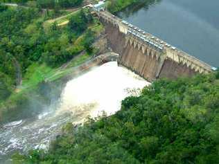 Water gushes from the Somerset Dam in this aerial shot take from a Pterodactyl helicopter. . Picture: Johey Kosta-Jarvis