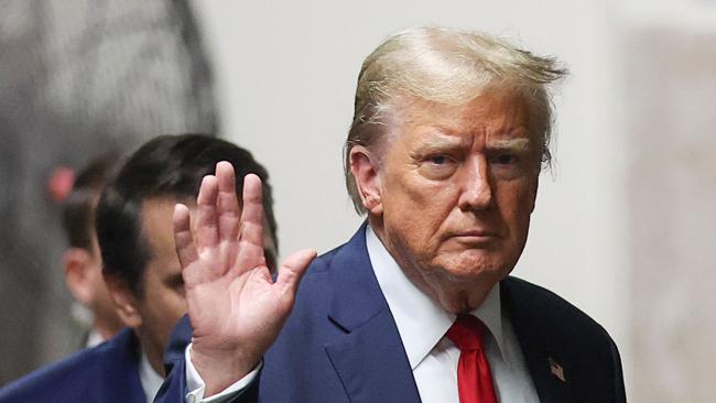 Donald Trump returns to the courtroom after a break on Thursday in his trial for allegedly covering up hush money payments linked to extramarital affairs at Manhattan Criminal Court in New York. Picture: Mike Segar / Pool / AFP