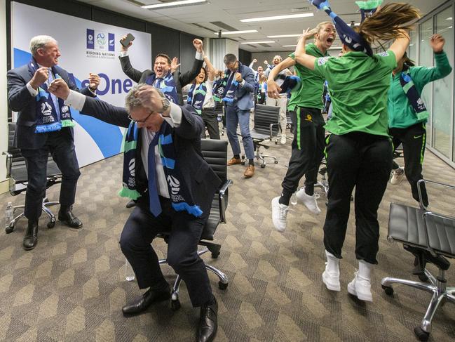 SYDNEY, AUSTRALIA - JUNE 26: Chris Nikou, Chairman of Football Federation Australia (C) along with officials and players react as FIFA announced Australia as the hosts to the 2023 FIFA Women's World Cup at the FFA Offices on June 26, 2020 in Sydney, Australia. (Photo by Jenny Evans/Getty Images) *** BESTPIX ***
