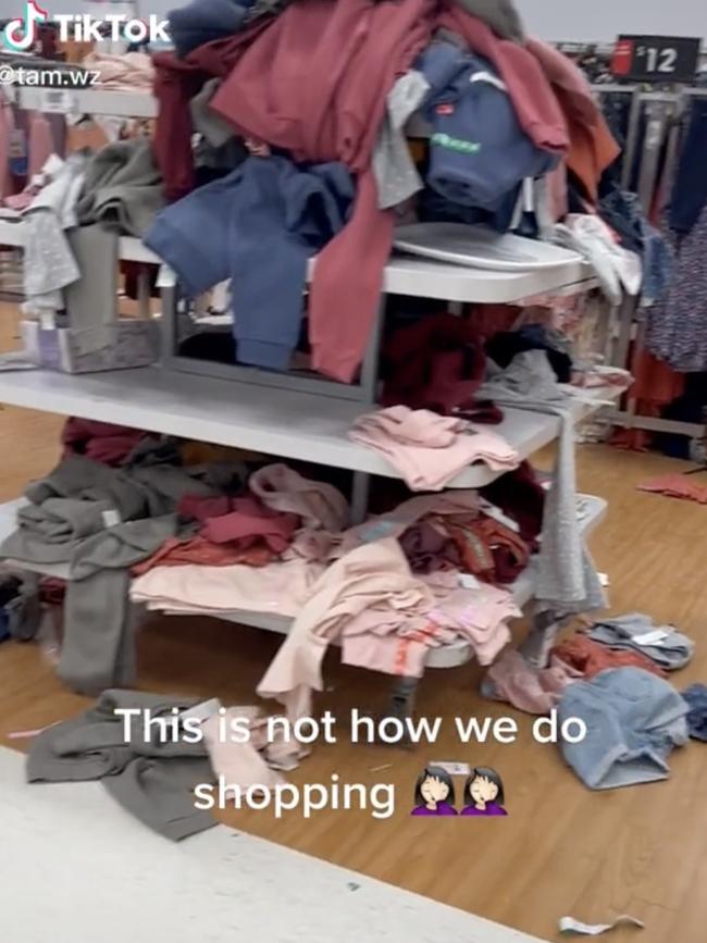 Clothes were shown strewn across shelves. Picture: TikTok/@tam.wz.