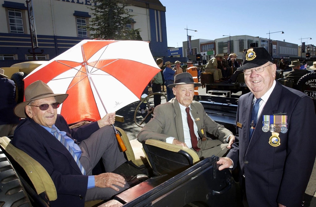 Catching up before the Anzac Day morning march are (from left) Len Clyde, Bert Miles and Ron MacKenzie, Monday, April 25, 2005. Picture: Kevin Farmer