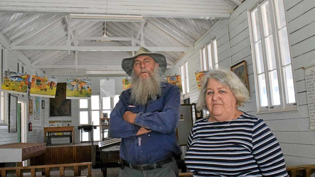 WRONGED: Chinchilla Historical Museum caretaker Oscar Lawrence and volunteer Joan Hubbard, pictured in the broken-in original Chinchilla State School, are disappointed in the recent museum theft. Picture: Amani Vassiliou