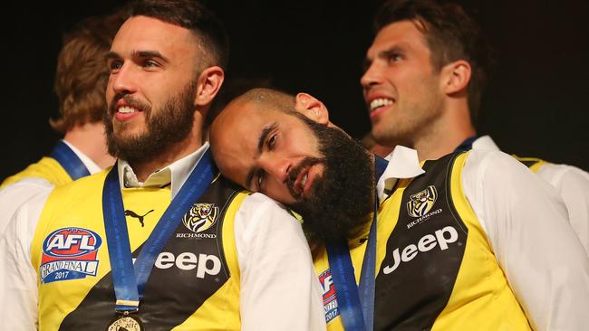 Shane Edwards, Bachar Houli and Alex Rance after Richmond’s premiership win.