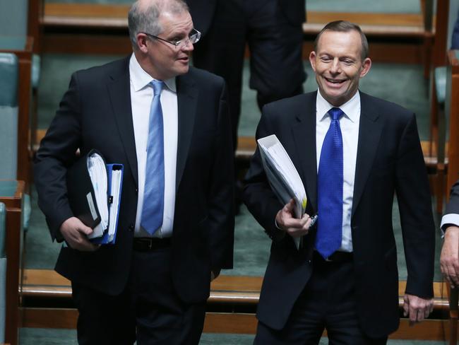 In happier times: Prime Minister Tony Abbott with Social Services Minister Scott Morrison during Question Time in the House of Representatives in 2015. Picture: Gary Ramage