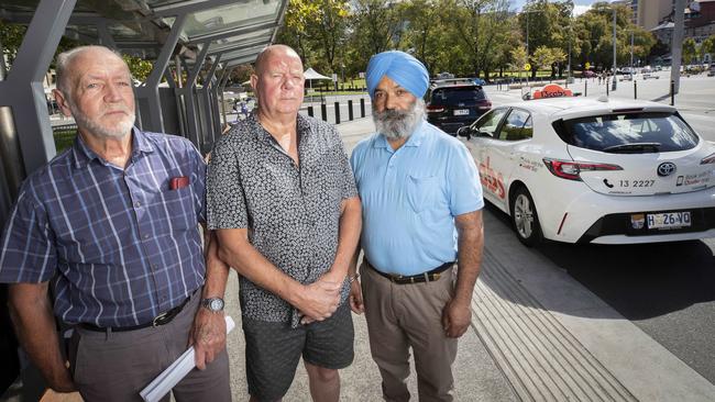 Retired taxi drivers Wim Burman, Guy Sullivan and current driver Harjinder Grewal at Salamanca. Picture: Chris Kidd