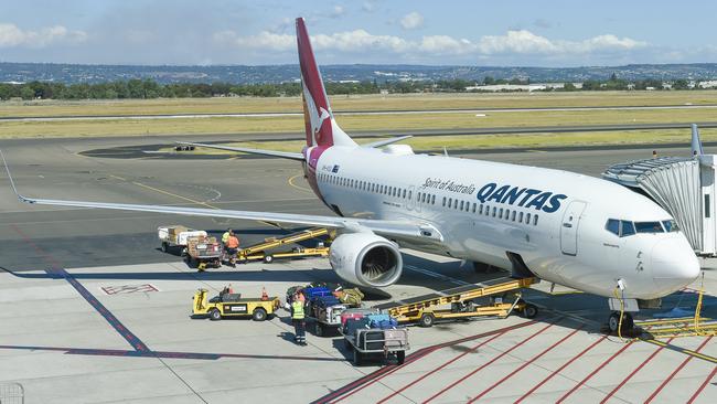 Qantas airport baggage handlers had their jobs outsourced to third party providers. Now their union is suing the airline saying it was done out of spite.