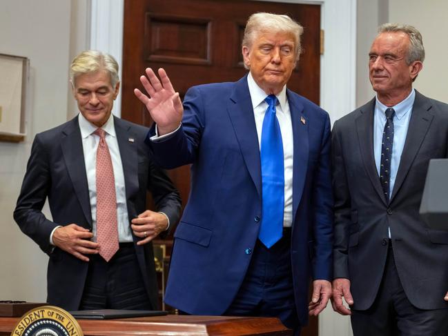 US President Donald Trump with Dr Mehmet Oz, Administrator of the Centres for Medicare & Medicaid Services, and Health and Human Services Secretary Robert F. Kennedy Jr. Picture: AP