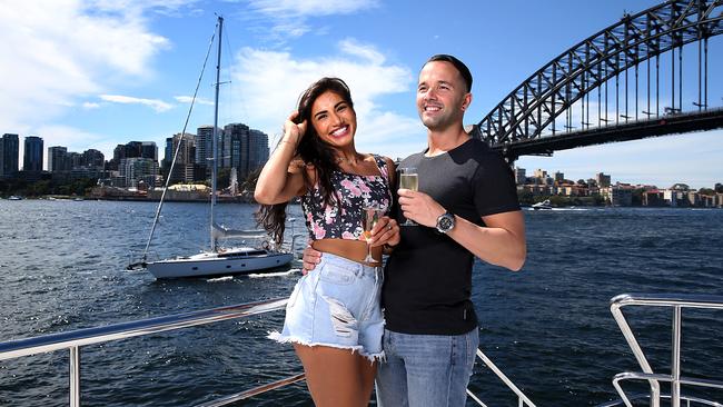 Melbourne couple Kareen Dhaliwal and Dimitris Litras enjoy Sydney’s sunshine and sights from the Spirit of Migloo on Easter Sunday. Picture: Jane Dempster