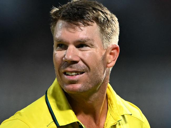 Australia's David Warner walks back to the pavilion after his dismissal during the 2023 ICC Men's Cricket World Cup one-day international (ODI) second semi-final match between Australia and South Africa at the Eden Gardens in Kolkata on November 16, 2023. (Photo by DIBYANGSHU SARKAR / AFP) / -- IMAGE RESTRICTED TO EDITORIAL USE - STRICTLY NO COMMERCIAL USE --