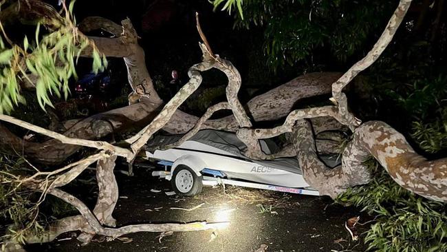 The SES was called after a tree fell onto and damaged a motorboat and trailer on Mona Vale Rd at Terrey Hills. Picture: SES Warringah/Pittwater