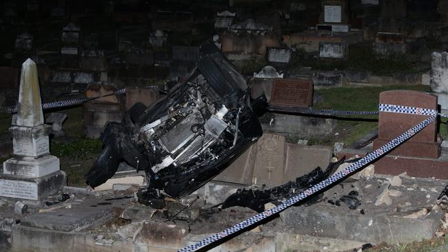 A number of graves were damaged as the vehicle crashed into the cemetery. Picture: Bill Hearne