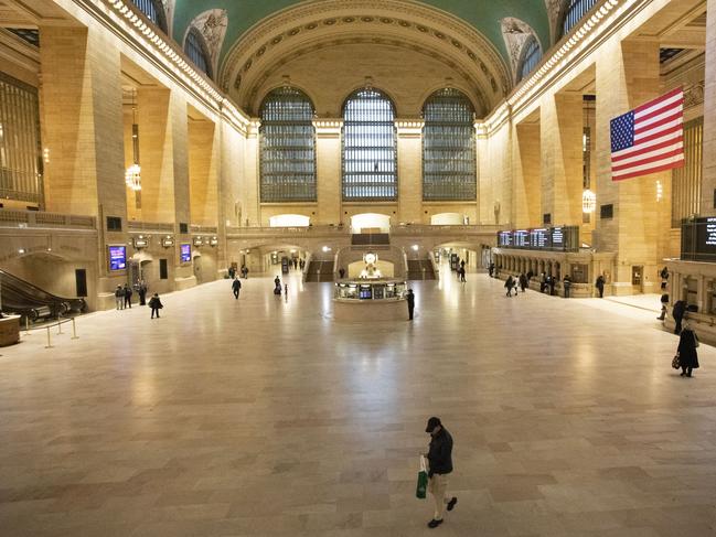 Commuters pass through an empty Grand Central Terminal in New York. Picture: AP