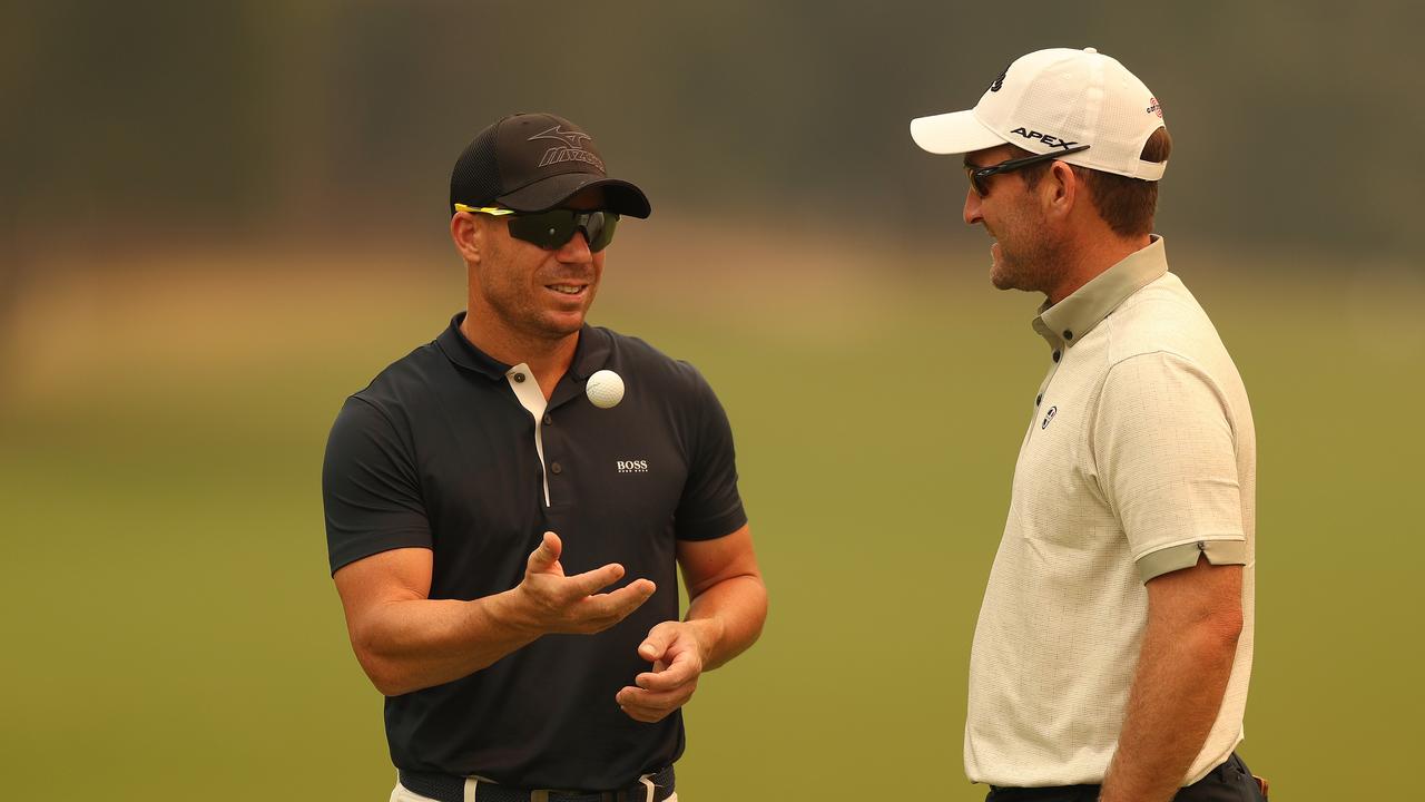 Cricketer David Warner with Josh Younger during the Australian Open Golf Pro-Am. Younger is the defending NSW Open champion. Pic: Brett Costello