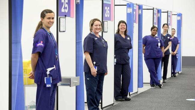 Nurses ready and waiting at the mass COVID-19 vaccination clinic at the Wayville Showgrounds. Picture: NCA NewsWire / Dean Martin