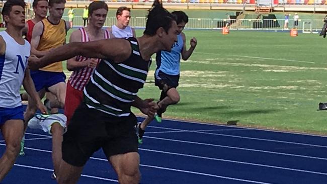 Xavier Savage powers to the line to win the 100m at the GPS Track and Field.