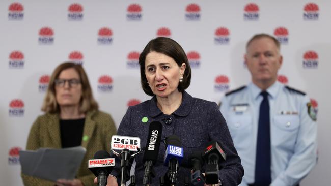 Dr Kerry Chant with Premier Gladys Berejiklian and NSW Police Commissioner Mick Fuller in Sydney today. Picture: Mark Metcalfe