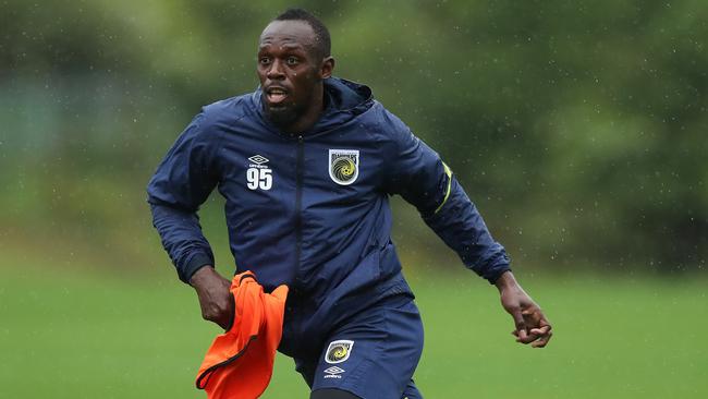 Olympic legend Usain Bolt has been soaking up advice from his Central Coast Mariners teammates as he tries to earn a contract with the club. Picture: Brett Costello