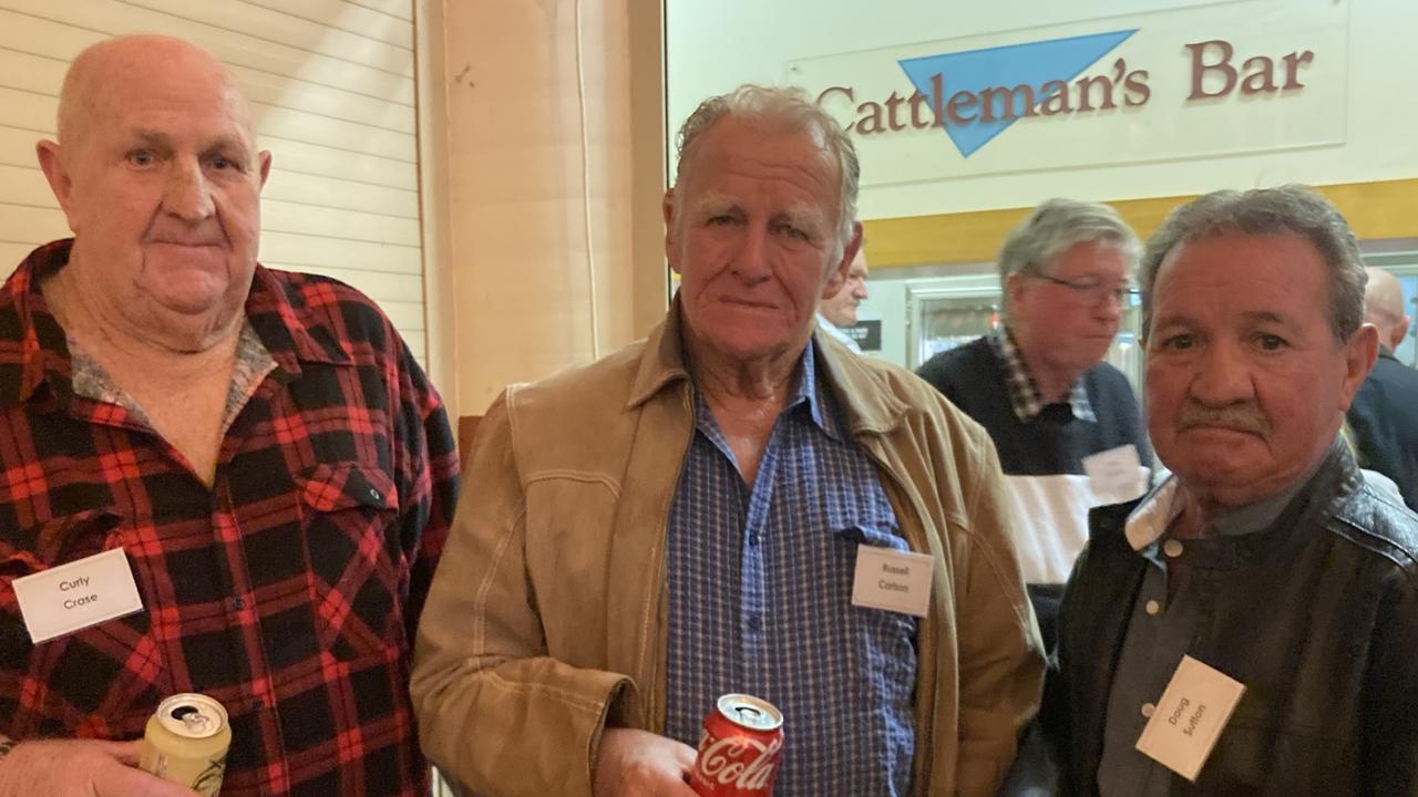 Curly Crase, Russell Carlson, and Doug Sutton celebrate the 50th anniversary of the Rainbows Rugby League Football Club at its golden jubilee at the Gympie Showgrounds Pavilion on the night of June 3, 2023.