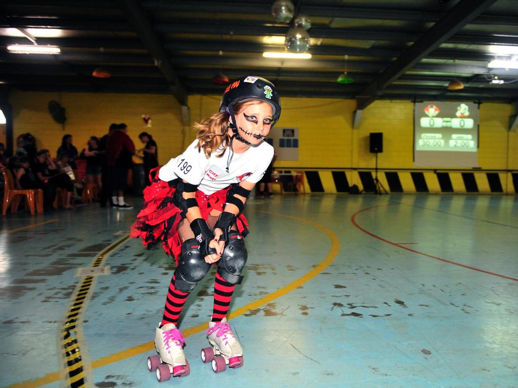 ROLLER DERBY: Rum City Rink Rat Tiffiny Andreson does a few warm up laps at the Roller Derby held at the Extreme Zone Skate Centre. Photo: Max Fleet / NewsMail