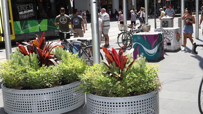 Anti-terror bollards in Bourke St mall are among the city’s new security measures. Picture: David Crosling