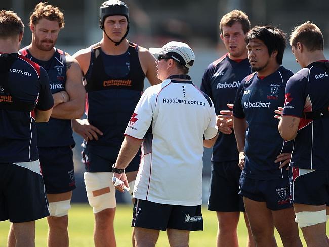 Tony McGahan gives instructions to players during a Melbourne Rebels Super Rugby training session at Visy Park on April 1.