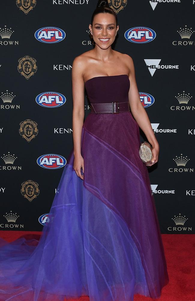 Jess Tarrant’s dress featured different shades of purple.