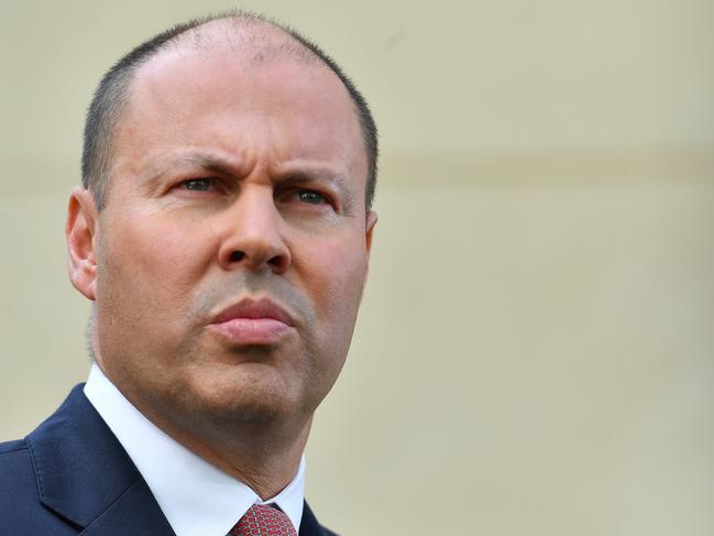 CANBERRA, AUSTRALIA - FEBRUARY 23: Treasurer Josh Frydenberg during a press conference in the Senate Courtyard at Parliament House on February 23, 2021 in Canberra, Australia. Facebook has previously banned publishers an users in Australia from posting it sharing news content as the Australian government prepares to pass laws that will require social media companies to pay news publishers for sharing using content on their platforms.  (Photo by Sam Mooy/Getty Images)