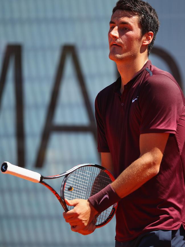 Bernard Tomic flipped his racquet backwards for match point against Fabio Fognini of Italy in their first round match at Mutua Madrid Open tennis tournament at the Caja Magica in 2016. (Photo by Clive Brunskill/Getty Images)