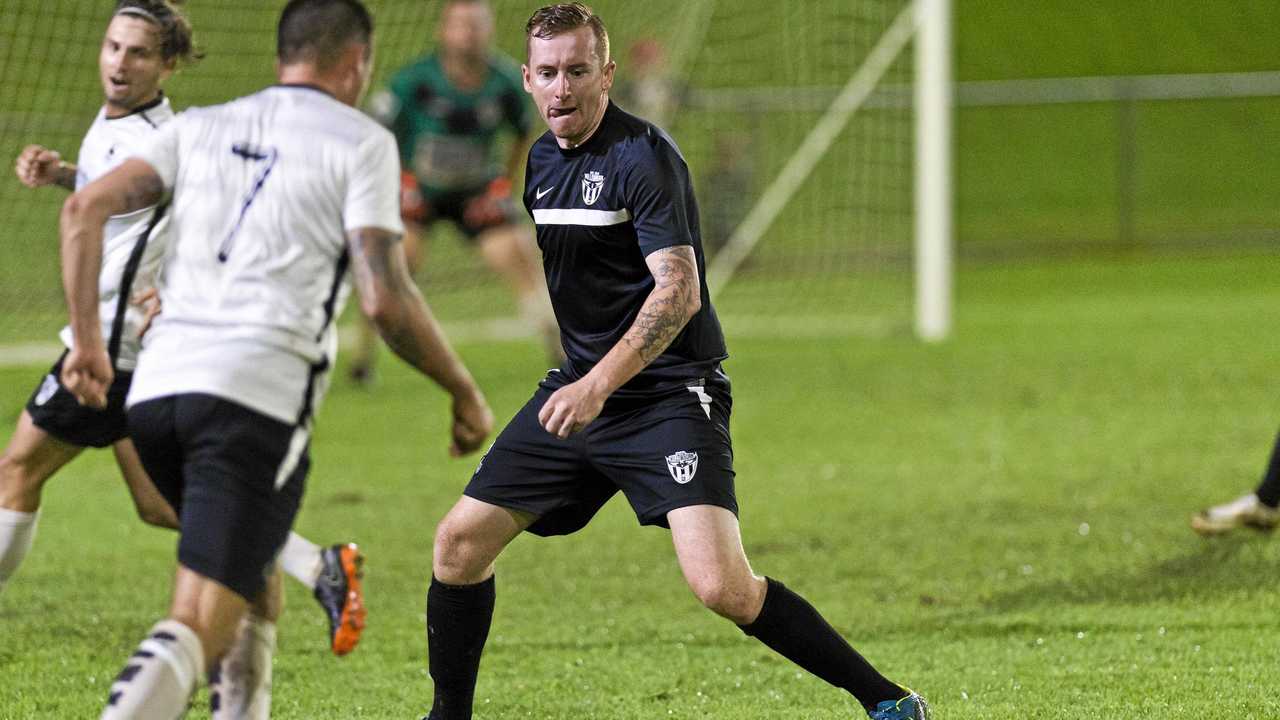 CLOSE ATTENTION: Willowburn White's Matthew Donovan moves to shut down his Willowburn FC opponent during a match earlier this season. New to the TFL Premier Men division's Willowburn White have shown solid early season form - running third. Picture: Kevin Farmer