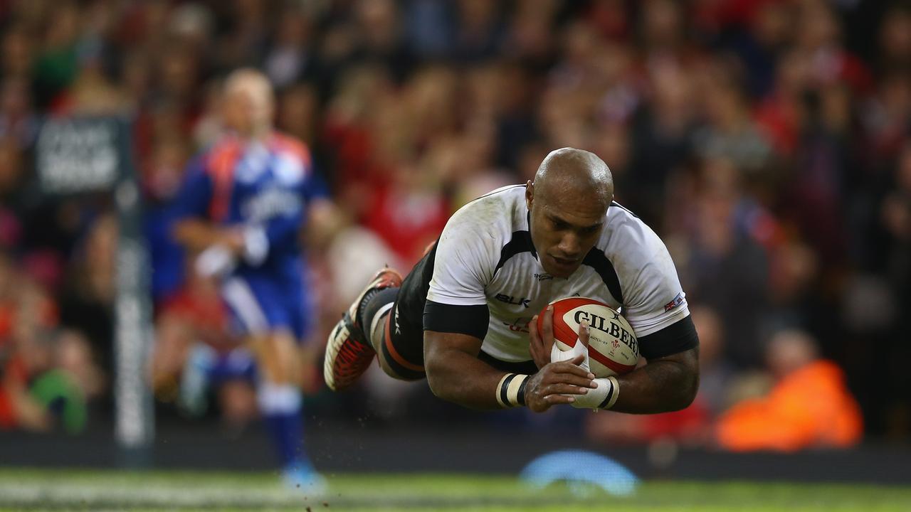 CARDIFF, WALES - NOVEMBER 15: Nemani Nadolo of Fiji dives over to score his sides try during the International match between Wales and Fiji at the Millennium Stadium on November 15, 2014 in Cardiff, Wales. (Photo by Michael Steele/Getty Images)