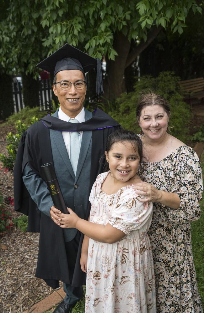 Bachelor of Laws graduate Bon Arribas with daughter Ariana and wife Karen Arribas at a UniSQ graduation ceremony at Empire Theatres, Tuesday, February 13, 2024. Picture: Kevin Farmer