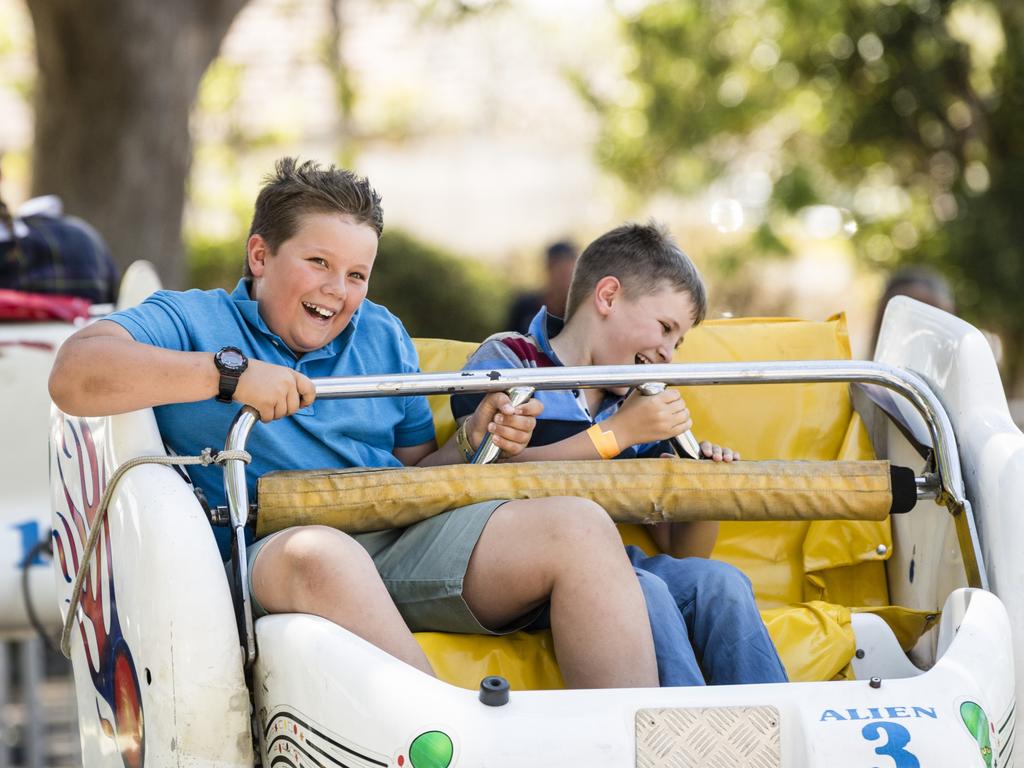 Having fun on a show ride are Hunter Ryrie (left) and Chett Smith at Fairholme College Spring Fair, Saturday, October 21, 2023. Picture: Kevin Farmer