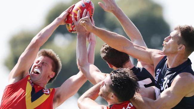 Nathan Cooper, right, represented the VFL against SANFL last year. (SANFL Image/David Mariuz)