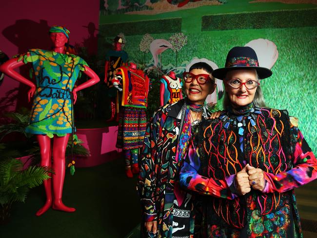 Designers Jenny Kee and Linda Jackson wear clothing from their 1970s boutique, Flamingo Park. Part of an exhibition at NGV International called 200 years of Australian Fashion. Photo: Aaron Francis