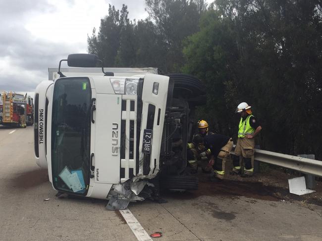 Truck on its side after a crash on the M1. Photo: Alison Marks