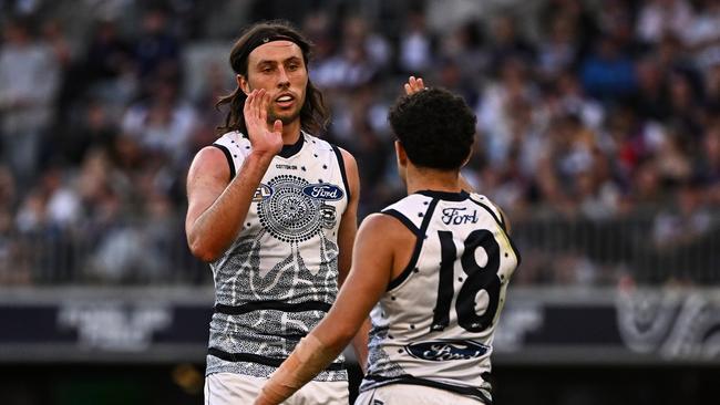 PERTH, AUSTRALIA - MAY 20: Jack Henry of the Cats celebrates a goal during the 2023 AFL Round 10 match between Walyalup/Fremantle Dockers and the Geelong Cats at Optus Stadium on May 20, 2023 in Perth, Australia. (Photo by Daniel Carson/AFL Photos via Getty Images)