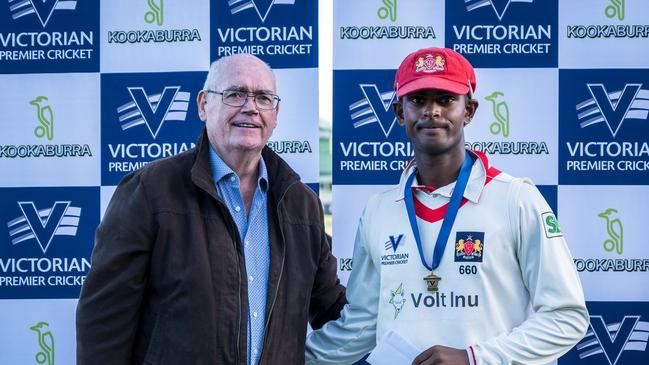 Ashley Chandrasinghe accepting his John Scholes Medal for best on ground. Pictures: Graeme Diggle