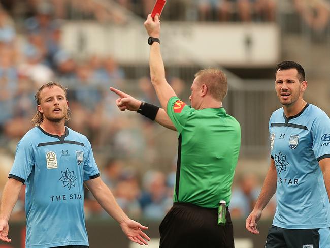 Rhyan Grant is sent off after the referee consulted VAR during the Round 12 A-League match between Sydney FC and Melbourne City.