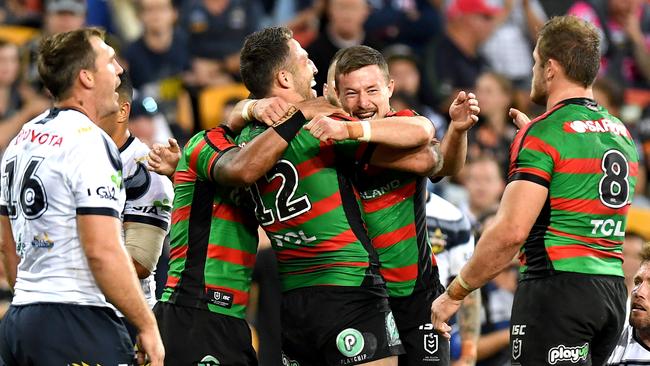 Damien Cook celebrates a try for the Rabbitohs. Picture: Getty Images