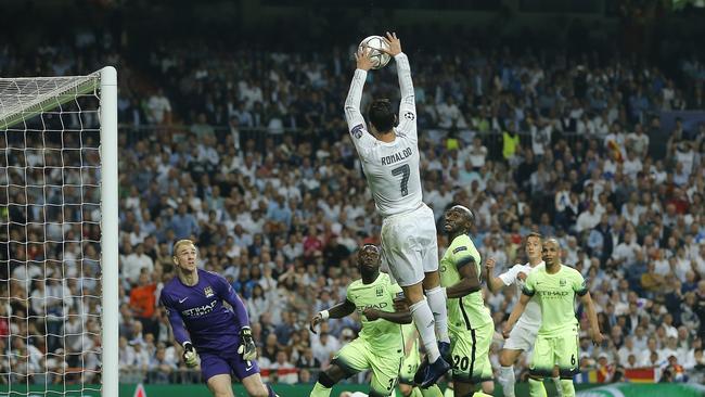 Real Madrid's Cristiano Ronaldo handles the ball during the Champions League semifinal.