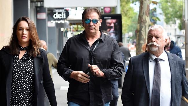 CFMEU figure John Setka, middle, appears at Melbourne Magistrates Court. Picture: NCA NewsWire / Nicki Connolly