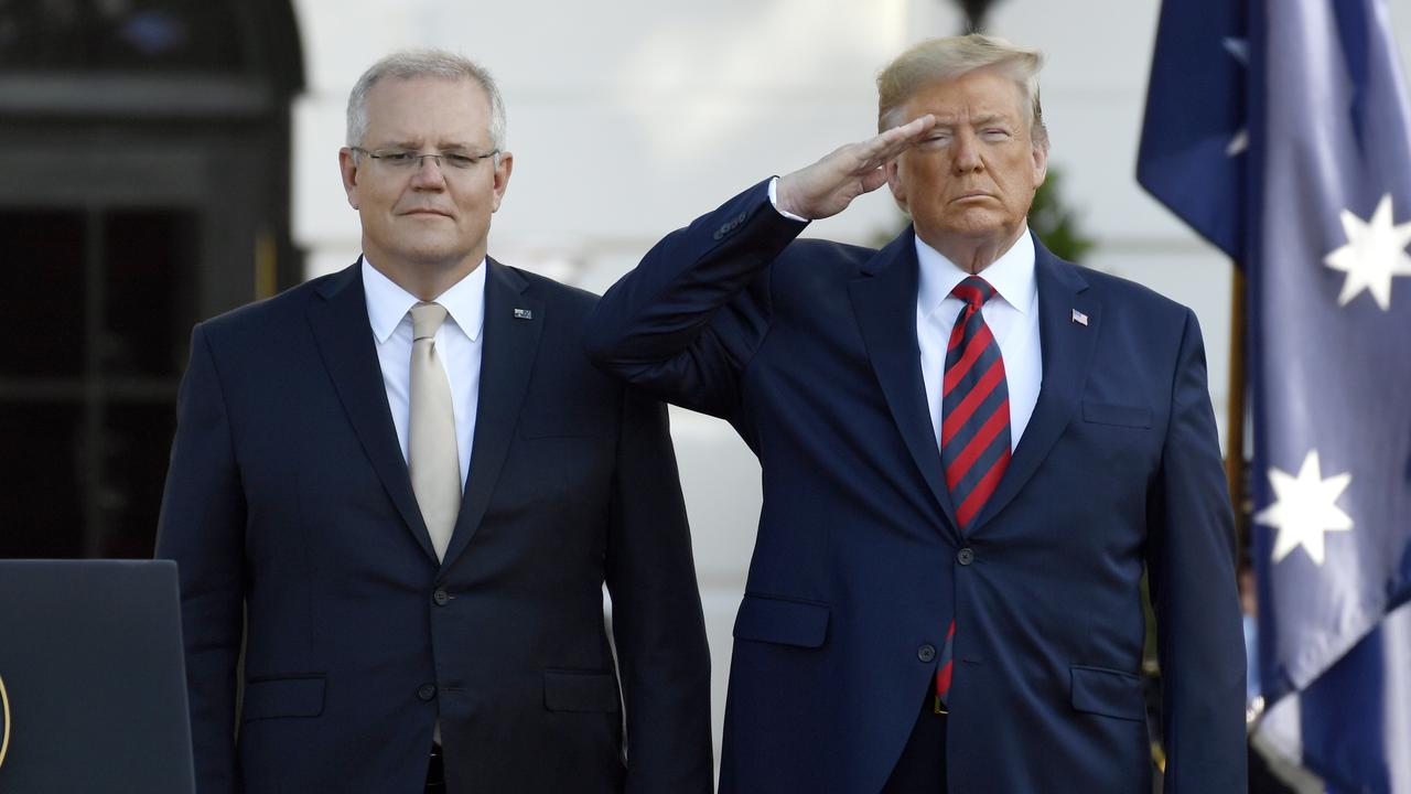 Australian Prime Minister Scott Morrison and US President Donald Trump listen to their National Anthems during a State Arrival Ceremony on the South Lawn of the White House in Washington, Friday, September 20, 2019. Picture: AP /Susan Walsh.