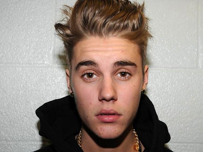 Hopefully Justin Bieber won’t party too hard next March. Photo: AP Photo/Miami Beach Police Dept., File