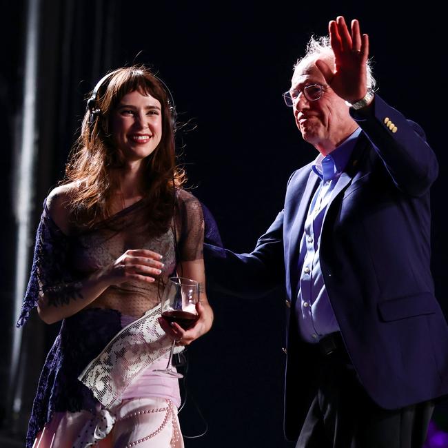 INDIO, CALIFORNIA - APRIL 12: (FOR EDITORIAL USE ONLY) (L-R) Clairo and Bernie Sanders speak onstage at Outdoor Theatre during the 2025 Coachella Valley Music and Arts Festival at Empire Polo Club on April 12, 2025 in Indio, California. (Photo by Emma McIntyre/Getty Images for Coachella)
