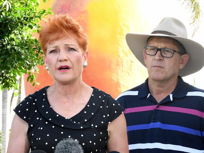 One Nation leader Pauline Hanson, pictured today with candidate for Bowen Sam Cox, has been playing hard to get. Picture: Dave Hunt/AAP