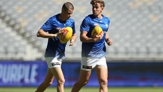 Bailey Scott (left) could win a recall at North Melbourne this week. Picture: Paul Kane/Getty Images. 